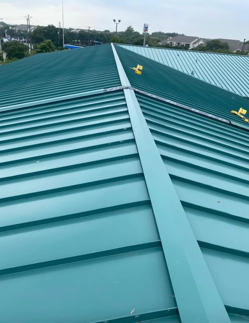 Green commercial metal roof ridge and valley for Metal Roof Repair in Garner
